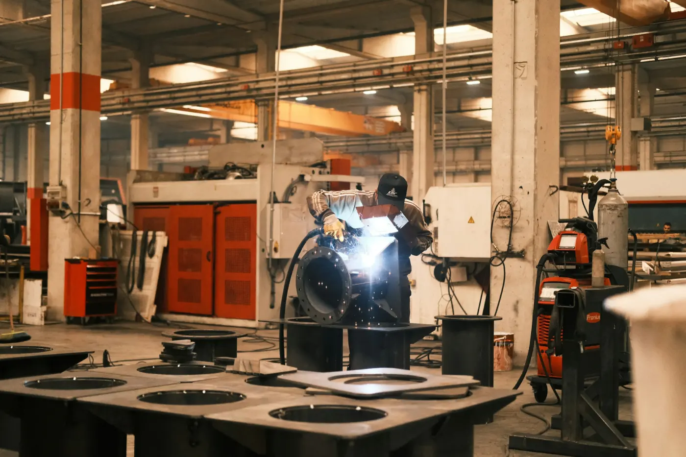 Welder joining sheet metal before finishing